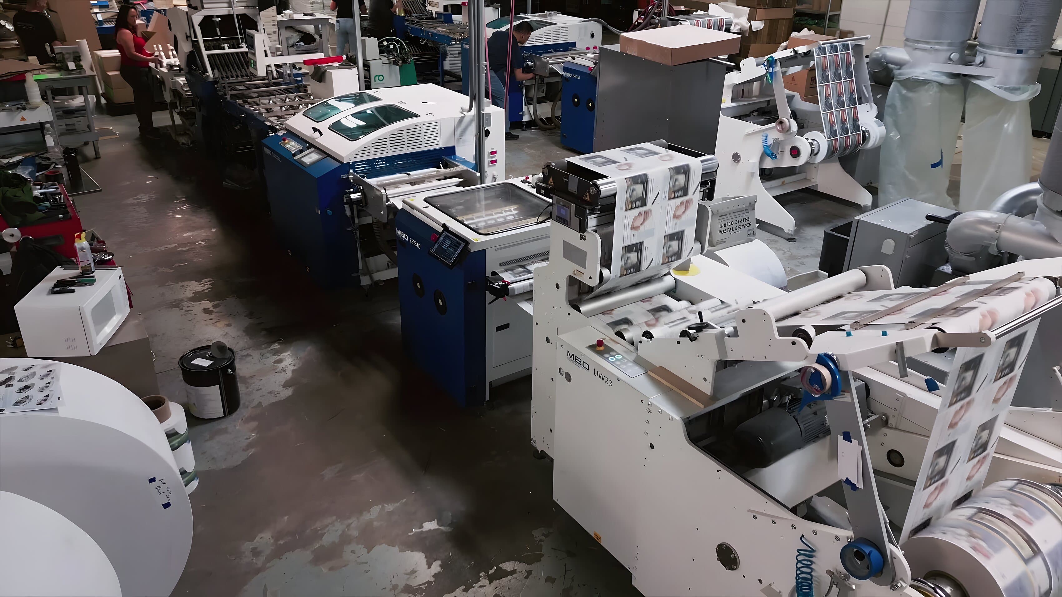 A JD Graphic operator on the production floor